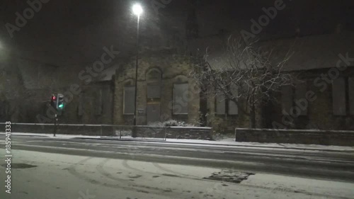 1.	Snowfall in city- a mesmerizing view on a snow falling down on road and Church, Newcastle upon Tyne, UK