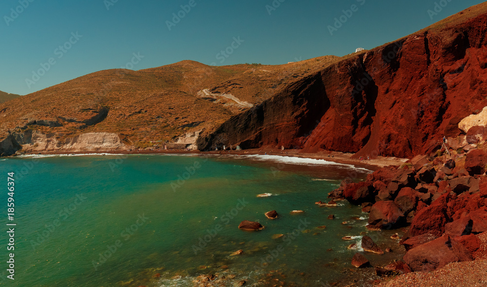 Wide angle shot of the red beach in Santorini, Greece