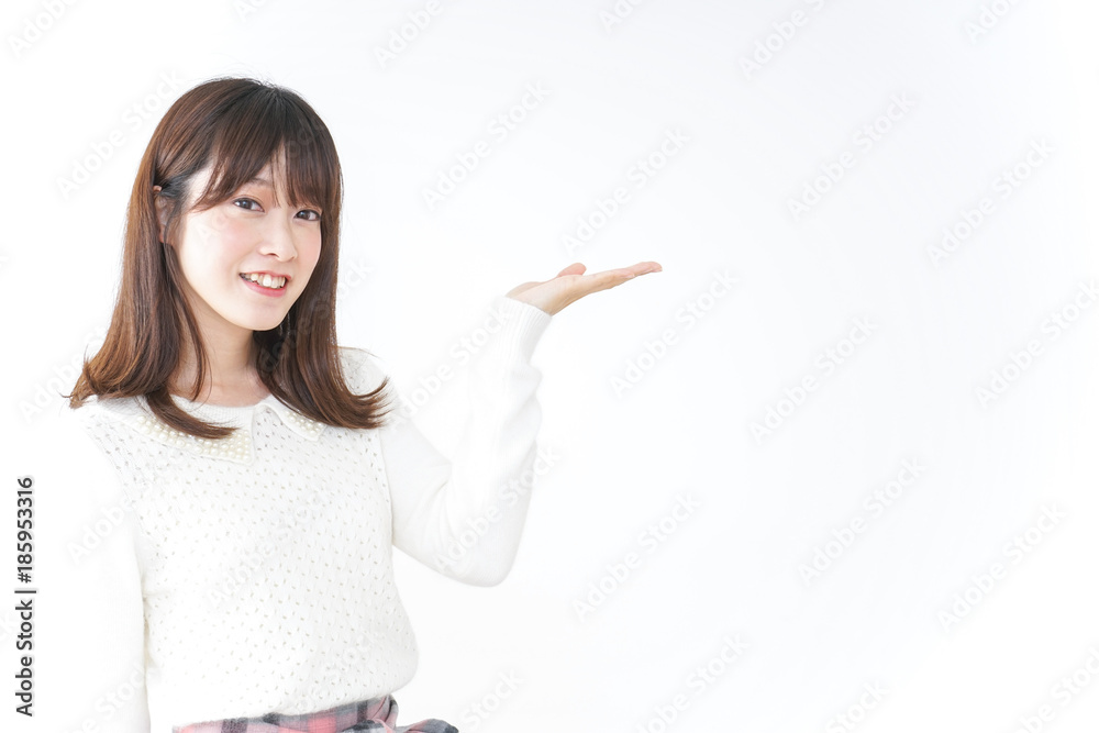 Young woman pointing to something Young woman pointing to something