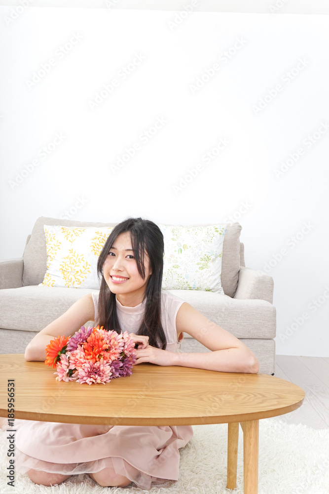Young woman having flower bouquet Young woman having flower bouquet