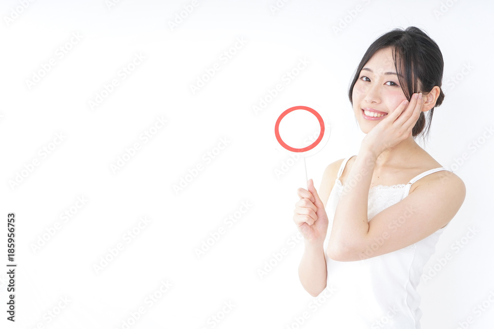 Young woman having ok sign