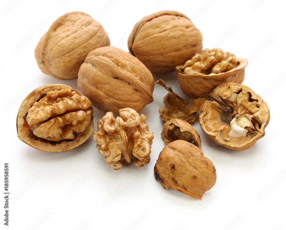 walnuts, kernel and shell isolated on white background walnuts, kernel and shell isolated on white background