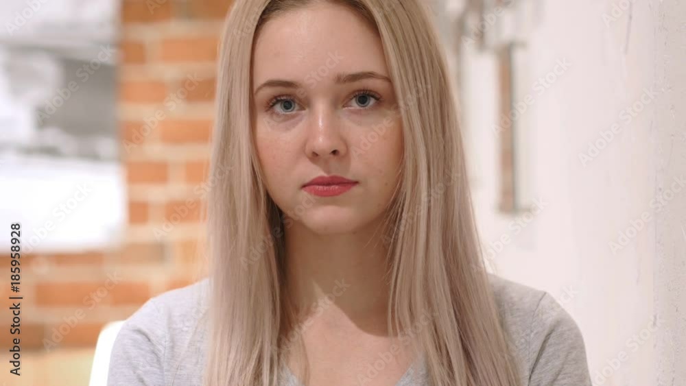 Portrait of Serious Young Woman, Loft Background Portrait of Serious Young Woman, Loft Background