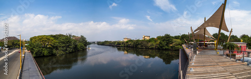 Panoramic view of Pedestrian walkway and park on the banks of Estero Salado in the city of Guayaquil