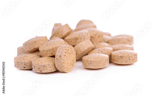 Pills of vitamin C isolated on white background.