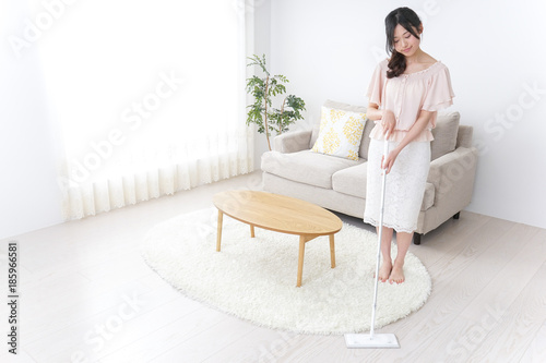 Young woman doing domestic duties
