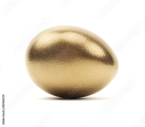 Isolated gold egg on a white background.
