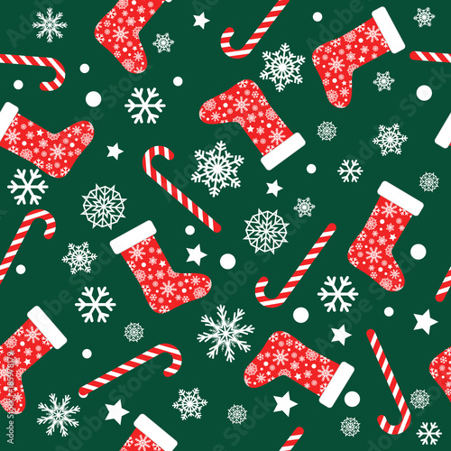Seamless vector pattern with red and white christmas stocking socks, candy canes and snowflakes