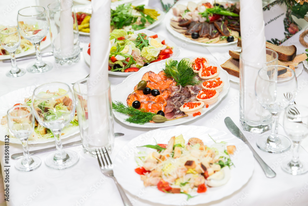 Snacks and delicacies at the Banquet table. Catering. Celebration or wedding. Buffet. Snacks and delicacies at the Banquet table. Catering. Celebration or wedding. Buffet.