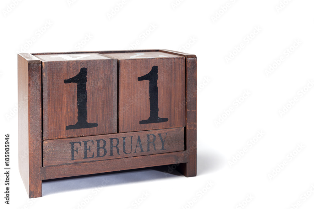 Obraz premium Wooden Perpetual Calendar set to February 11th