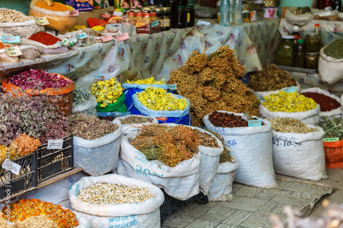 Bags of dried herbal tea for sale at city local market. Lahic. Azerbaijan photo