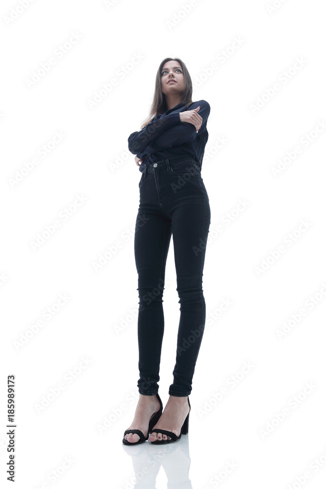View from below young business woman standing. View from below young business woman standing.