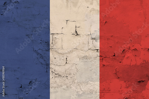 France flag against the old wall background © yavyav