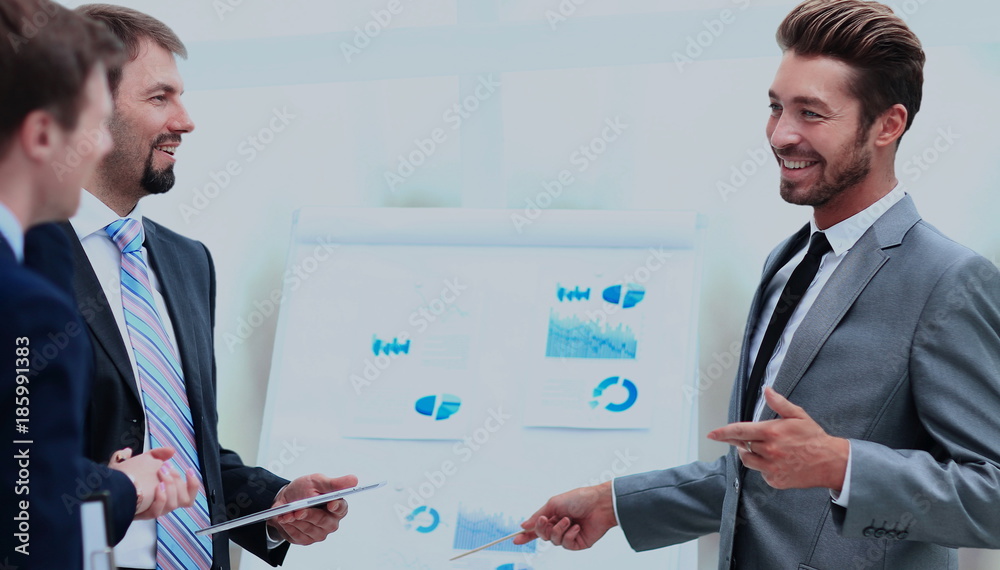 Business team discussing acquisition in meeting Business team discussing acquisition in meeting