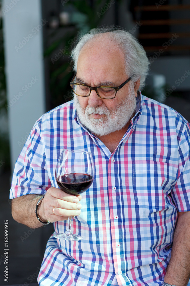 Mature man drinking wine Mature man drinking wine
