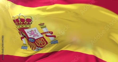 Spain flag waving at wind in slow, loop photo