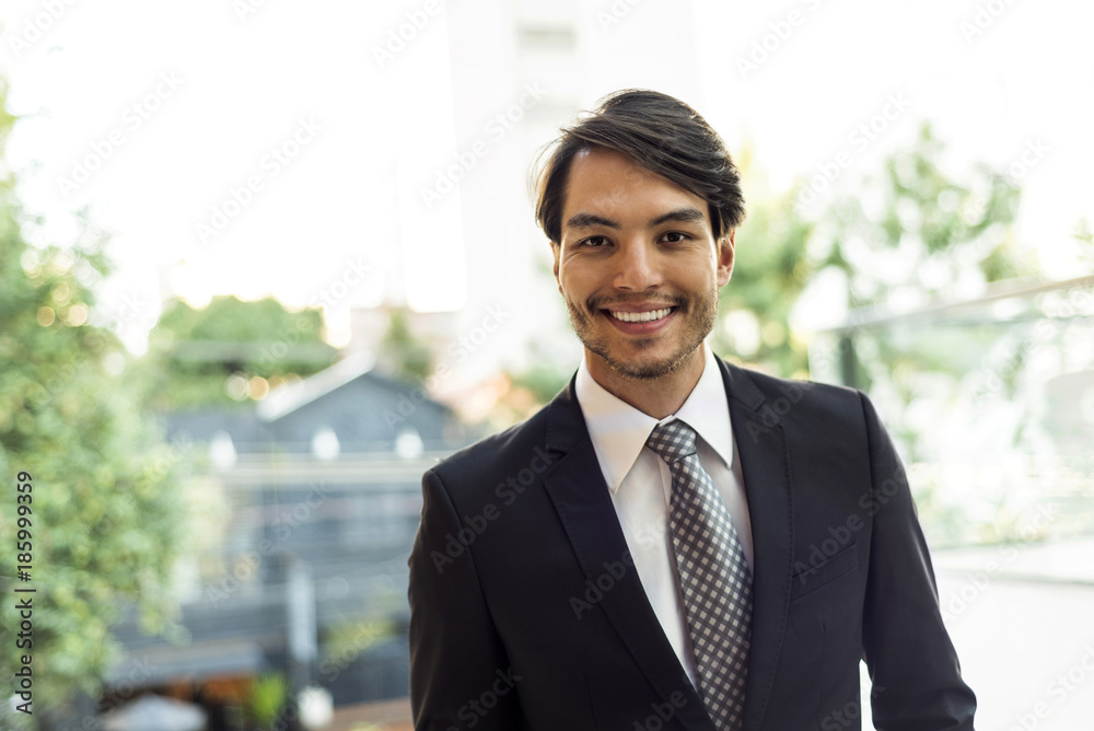 Portrait of smiling businessman outdoors Portrait of smiling businessman outdoors