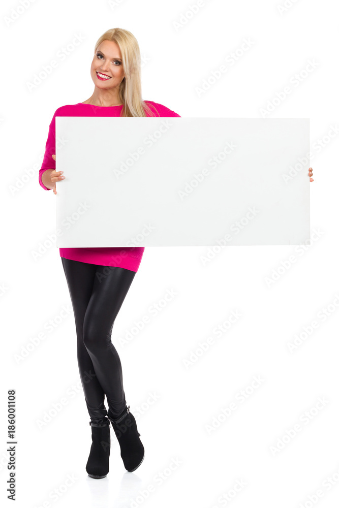 Smiling Beautiful Woman Is Posing With White Placard Smiling Beautiful Woman Is Posing With White Placard
