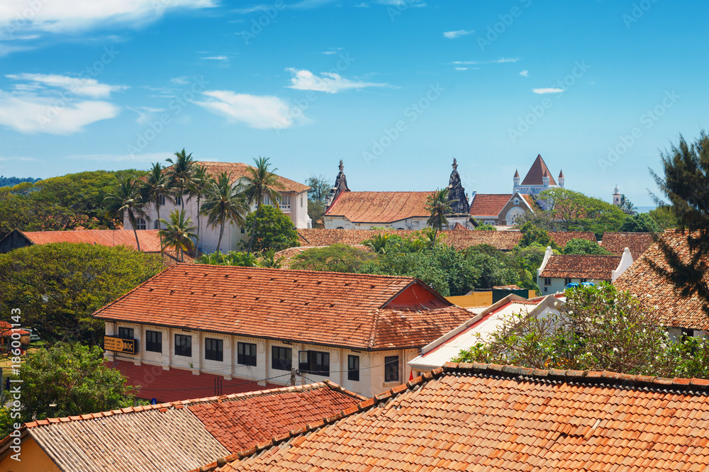 Beautiful scenery of ancient Dutch Galle Fort with Christian church and Buddhist stupa - view from fortification wall, southwest coast of Sri Lanka island, South Asia