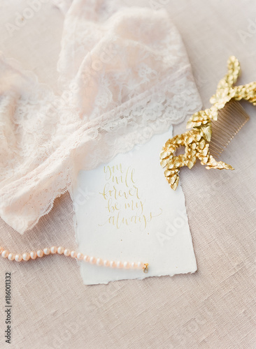 pink lingerie with calligraphy quote