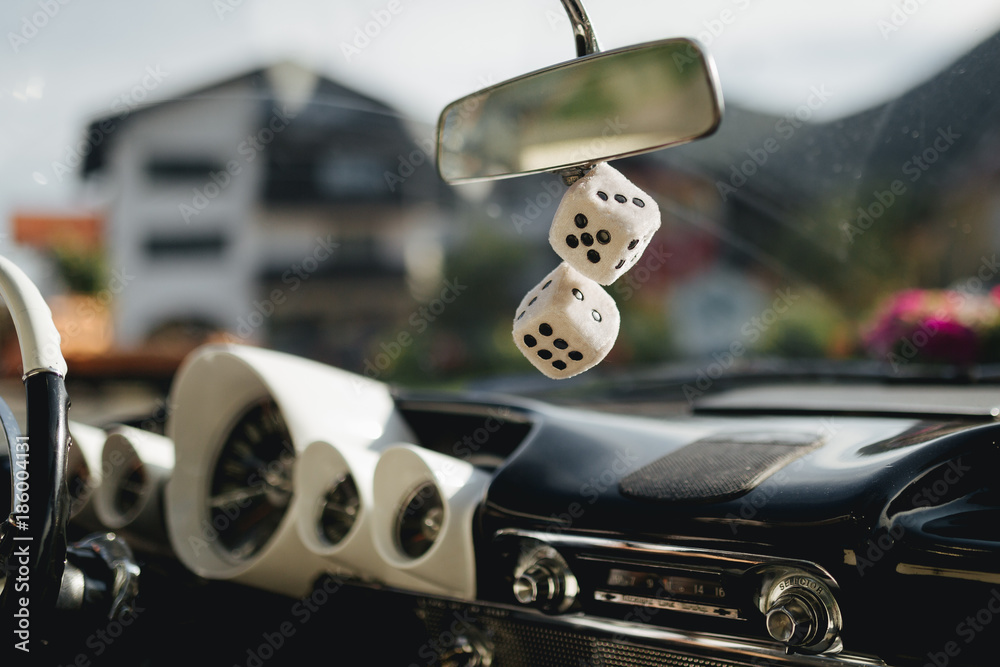 Fuzzy dice in the car Stock Photo Adobe Stock