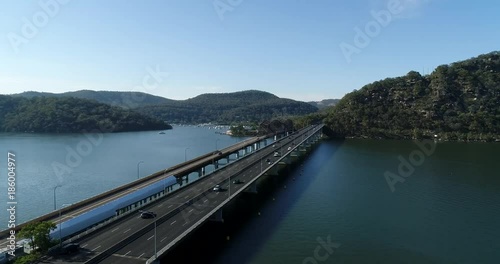 Wallpaper Mural Hawkesbury river on Australian central coast off Greater Sydney with M1 highway bridge aerial panning over water.
 Torontodigital.ca