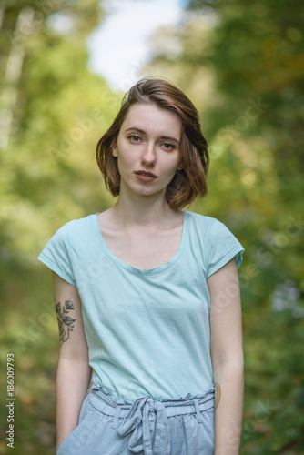 Portrait of beautiful sensual woman with freckles.