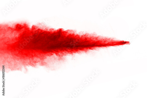abstract powder splatted background. Red powder explosion on black background. Colored cloud. Colorful dust explode. Paint Holi.