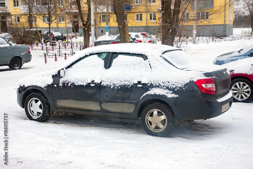 The cars in the Parking lot in the winter. Car covered with snow © pro2audio