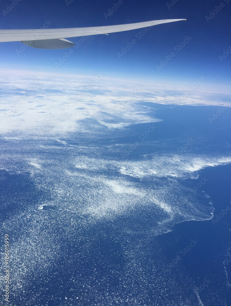 plane over ice fields