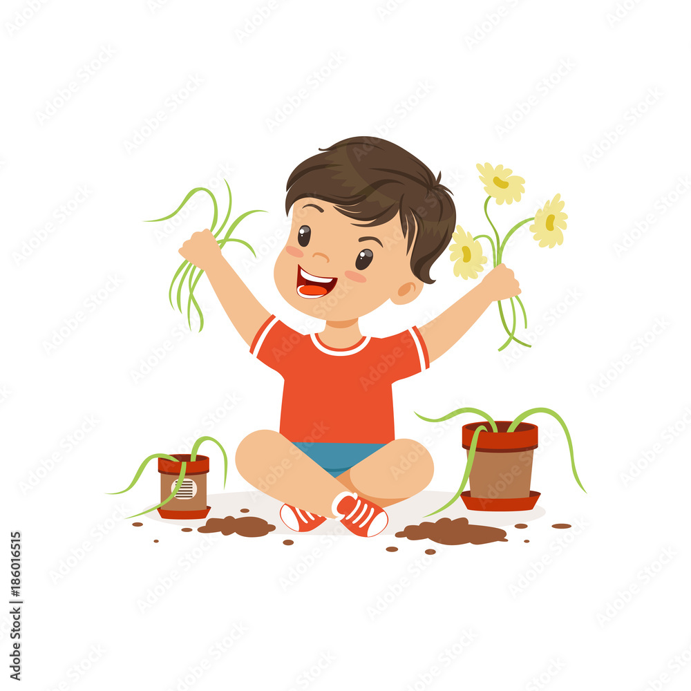 Cute little bully boy sitting on the floor and tearing flowers from ...