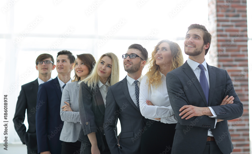 successful business team looking at copy space. successful business team looking at copy space.