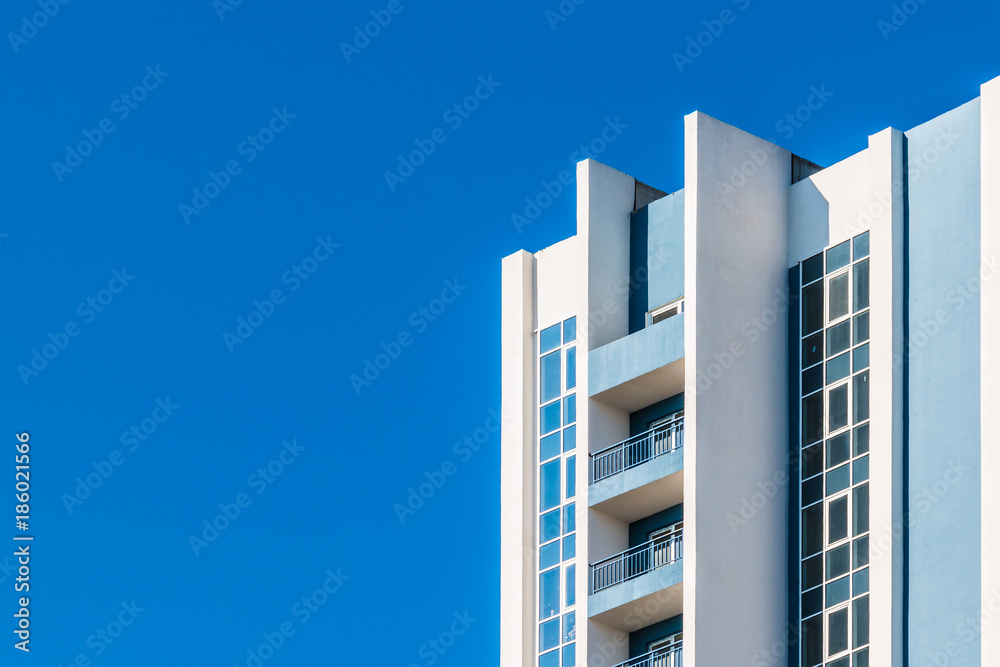 Low angle view of a corner of the urban apartment building on the background of clear sky, Sochi, Russia
Low angle view of a corner of the urban apartment building on the background of clear sky, Sochi, Russia