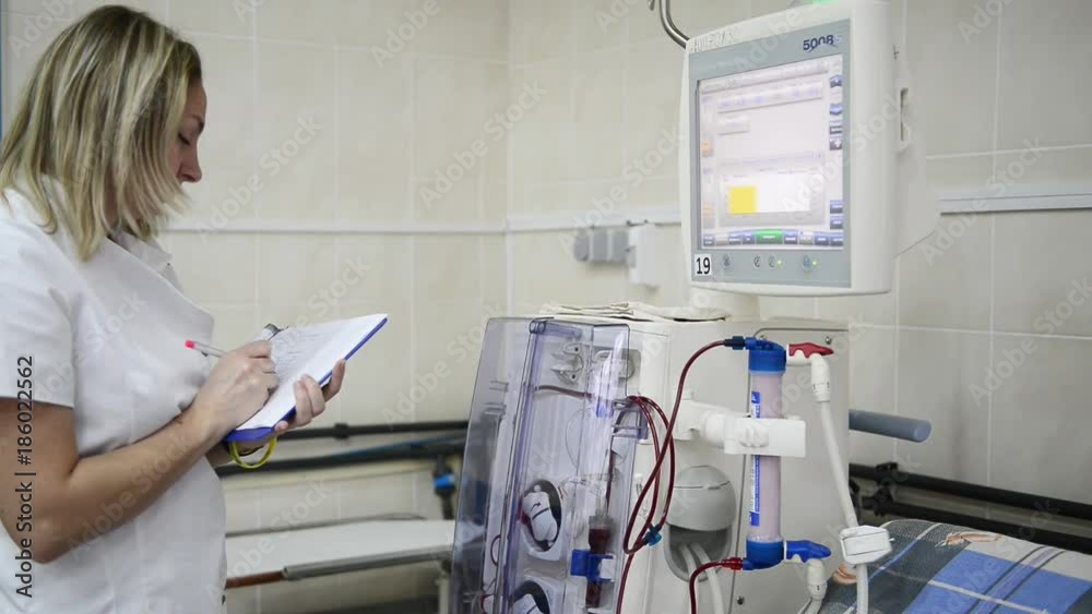 a female doctor records the data of the disease a female doctor records the data of the disease
