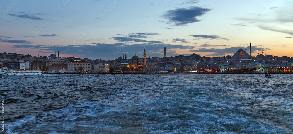 Panorama of Cityscape of Golden horn with ancient street and modern buildings in summer Istanbul is a transcontinental city in Eurasia, straddling the Bosphorus strait