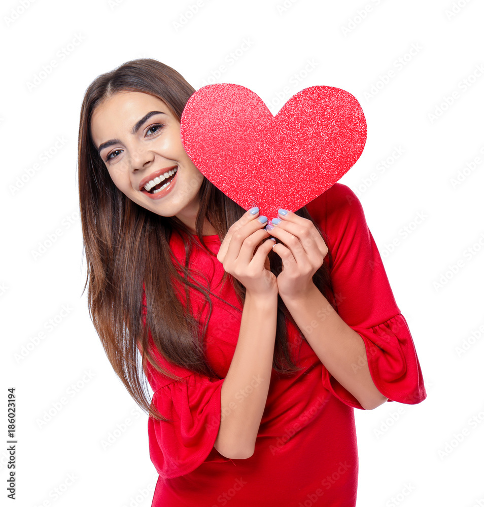 Romantic young woman with paper heart on white background Romantic young woman with paper heart on white background