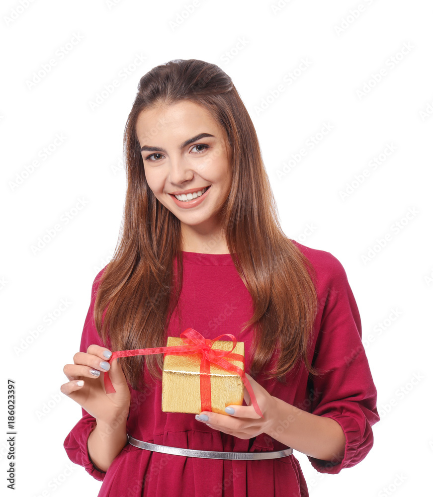Beautiful young woman with gift for Valentine's Day on white background Beautiful young woman with gift for Valentine's Day on white background