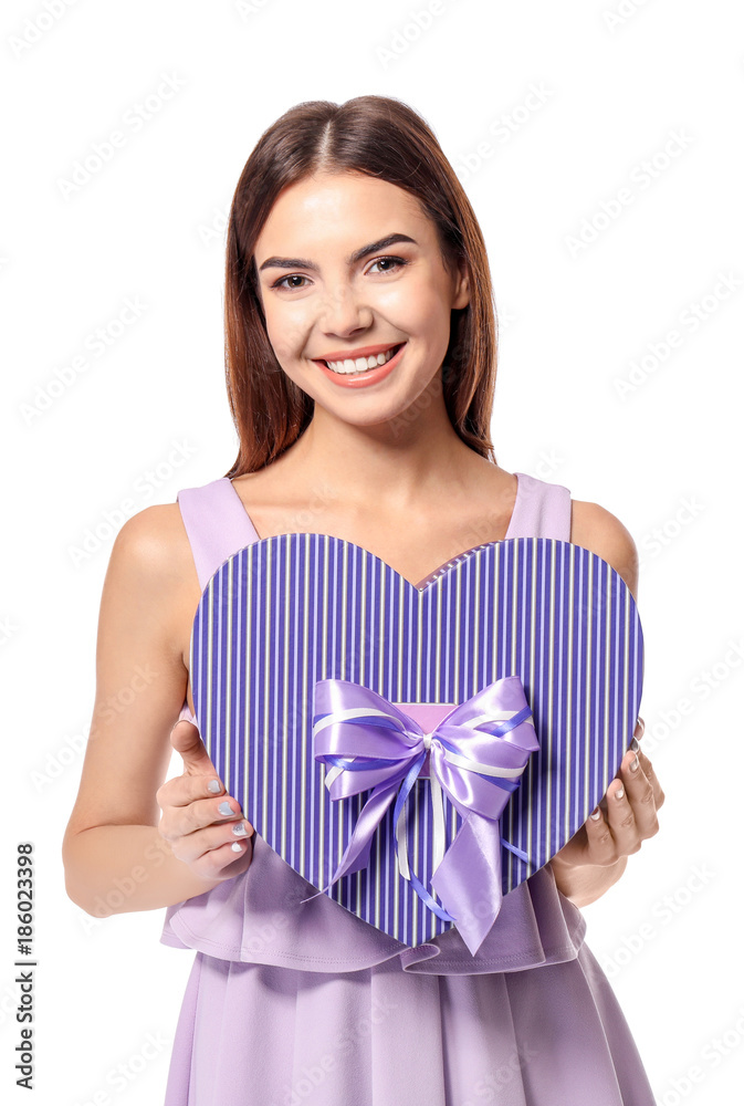 Beautiful young woman with gift for Valentine's Day on white background Beautiful young woman with gift for Valentine's Day on white background