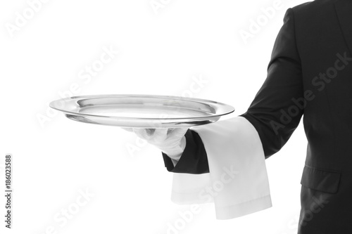 Waiter with empty tray on white background photo