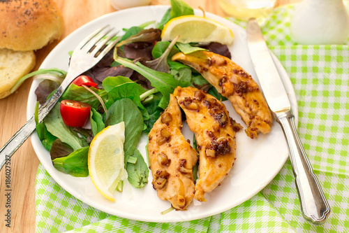 Healthy chicken breasts in honey and soy glaze with garlic