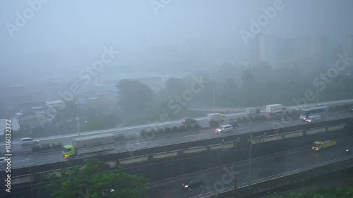 Rain storm. Worst situation while bad weather in Jakarta. photo