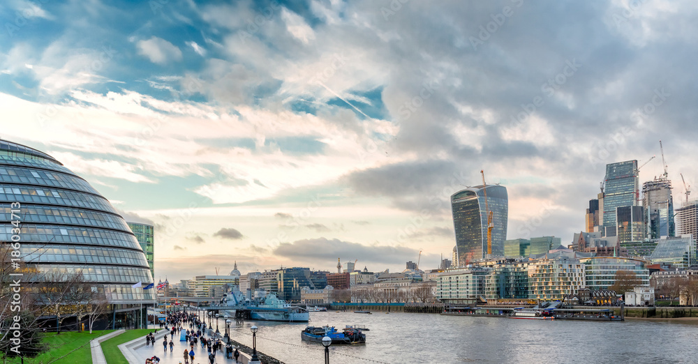 View from Tower Bridge on London Cityscape panorama with  HMS Belfast iand Town Hall