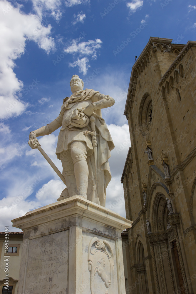 Statue in front of the Arezzo Cathedral, Italy