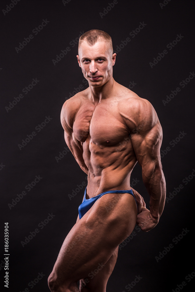 young bodybuider posing