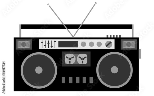 Old, black and white, cassette retro audio stereo recorder of the 80s on a white background.