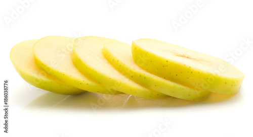 Sliced apple (Smeralda variety) isolated on white background five sliced rings.