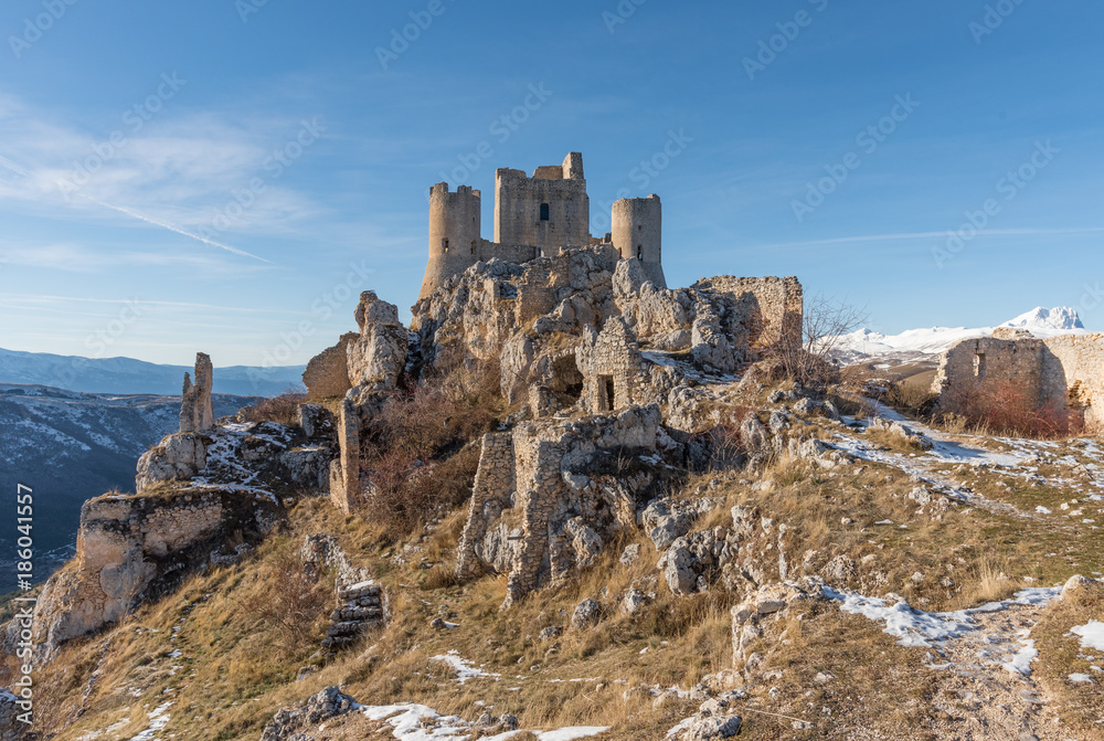 Rocca Calascio (Italy) - The ruins of an old medieval village with castle and church, over 1400 meters above sea level, on the Apennine mountains, in the heart of Abruzzo.