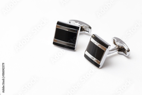 cufflinks silver on white backgrounds photo