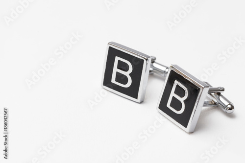 cufflinks silver on white backgrounds photo