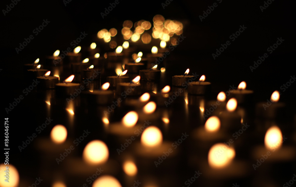 Wave of light - path made of candles at night